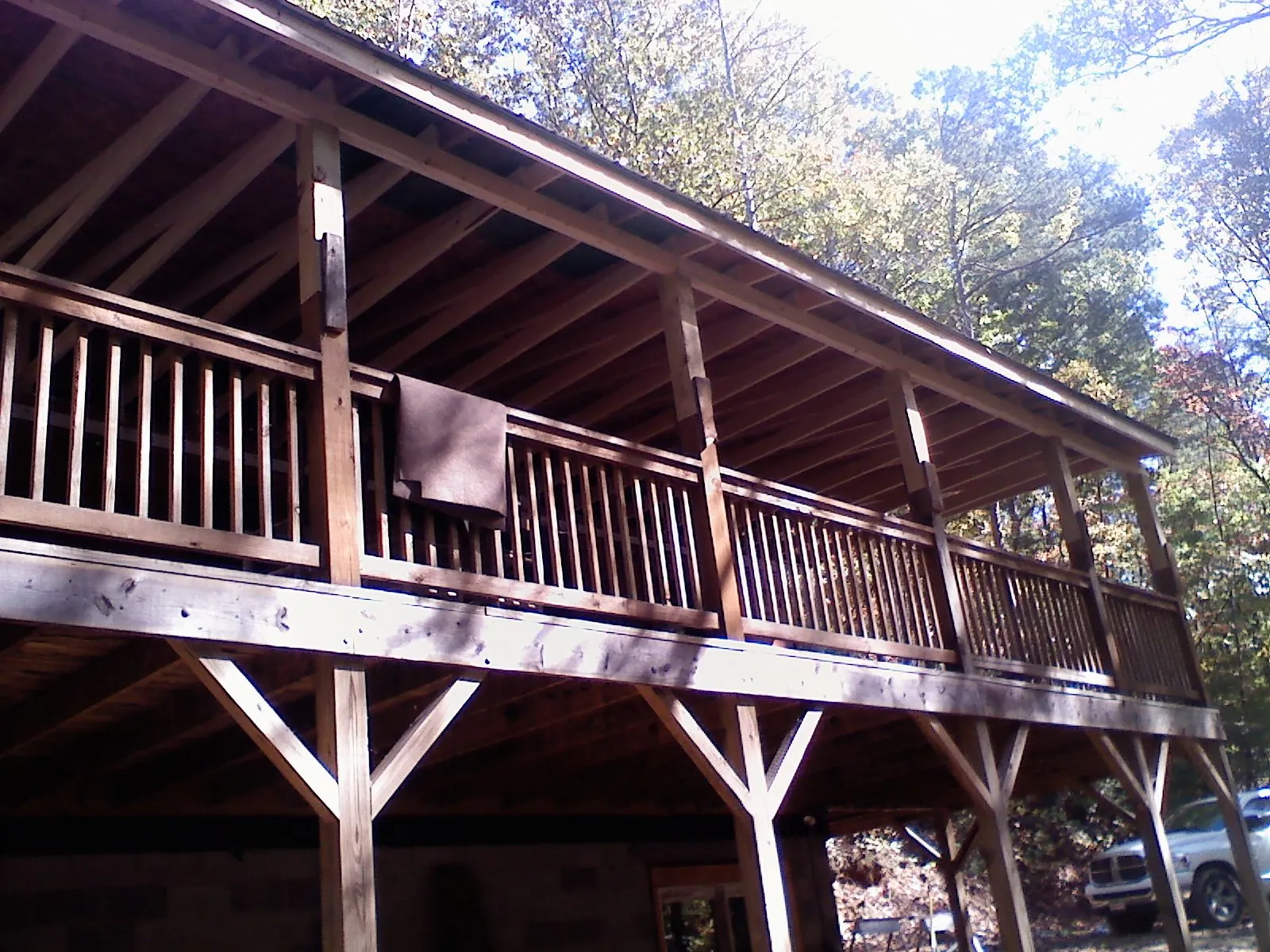 Timber framing under a new elevated porch and deck — Roof Leak Repair in Bagdad by Roofing Brothers